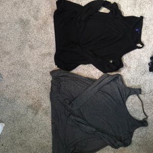 two long sleeve shirts with the shoulders cut out